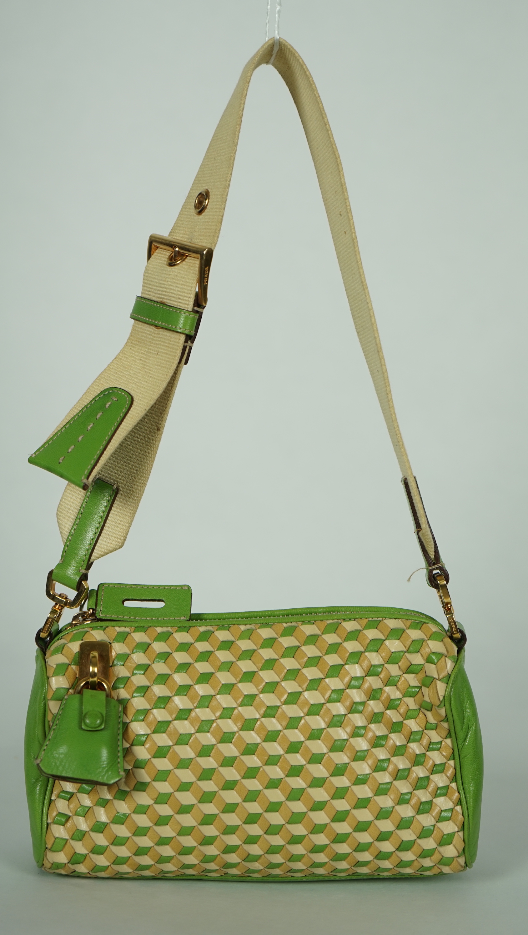 A Prada green and beige leather Intreccio Cube shoulder bag, width 20cm, height 13cm, depth 5.5cm